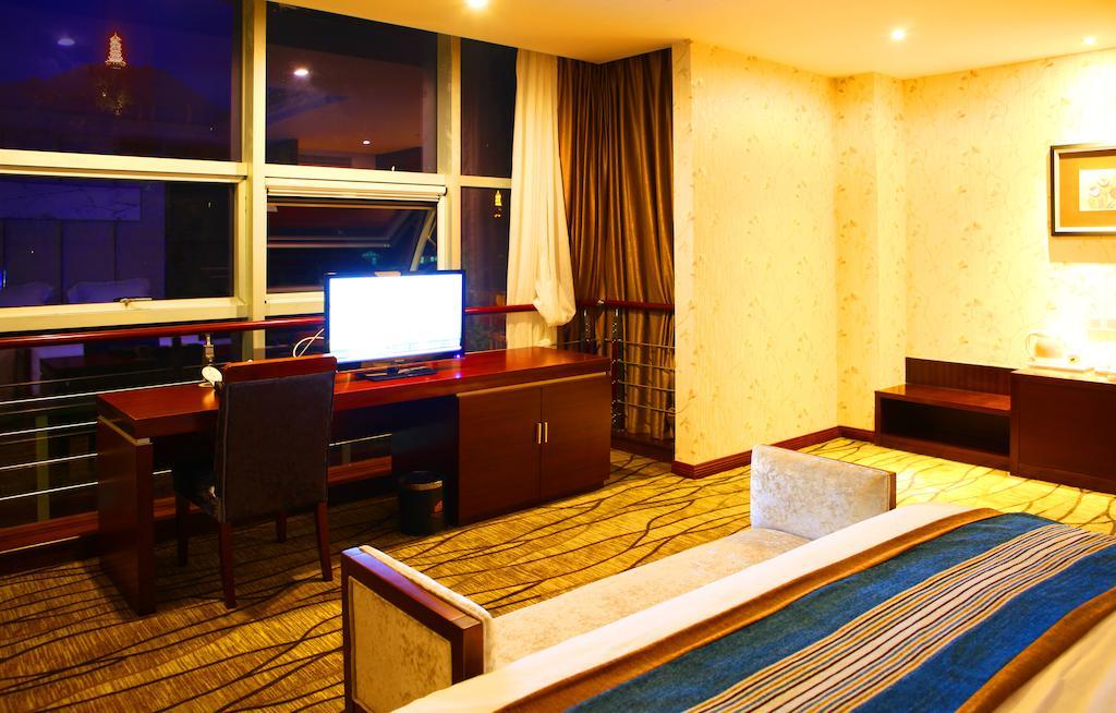 Mingcheng Times Hotel Chengdu Quarto foto